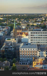 Historical cityscape with old and modern houses Riga city, Latvia in a summer sunny day.. Aerial view from drone of historical parts of Riga, Latvia.