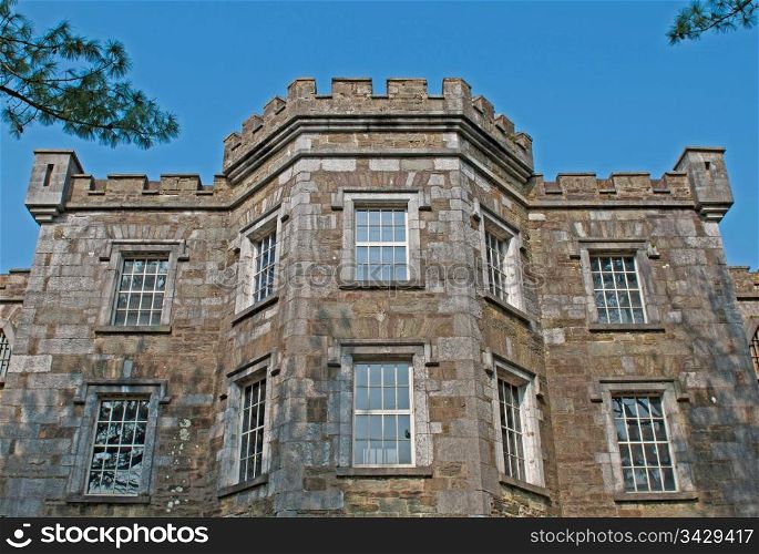historical Cork City Gaol prison in Cork, Ireland (blue sky background)