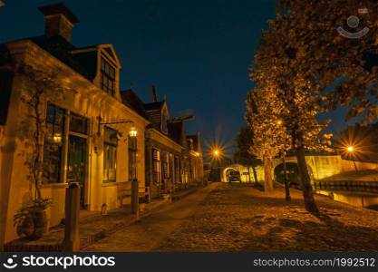 Historical houses in the city Sloten in the Netherlands at night