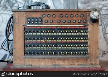 Historical, telecommunications system. Old vintage telephone switchboard.
