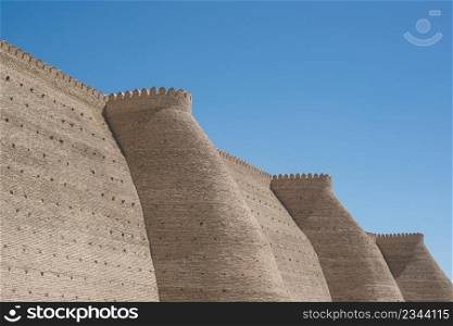 Historical walls of Ark fortress in Bukhara, Central Asia. fortress in Bukhara