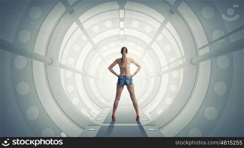 Hitch hiker woman in virtual room. Beautiful woman in swimsuit standing in modern interior
