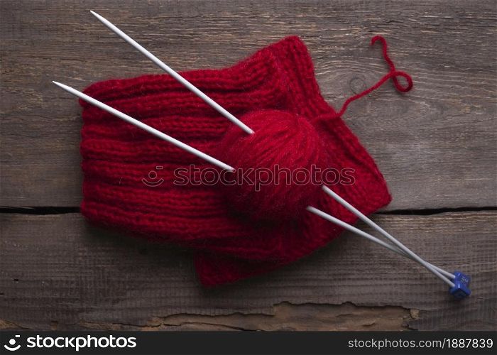 hobby. knitting - balls threads and knitting needles on a wooden table