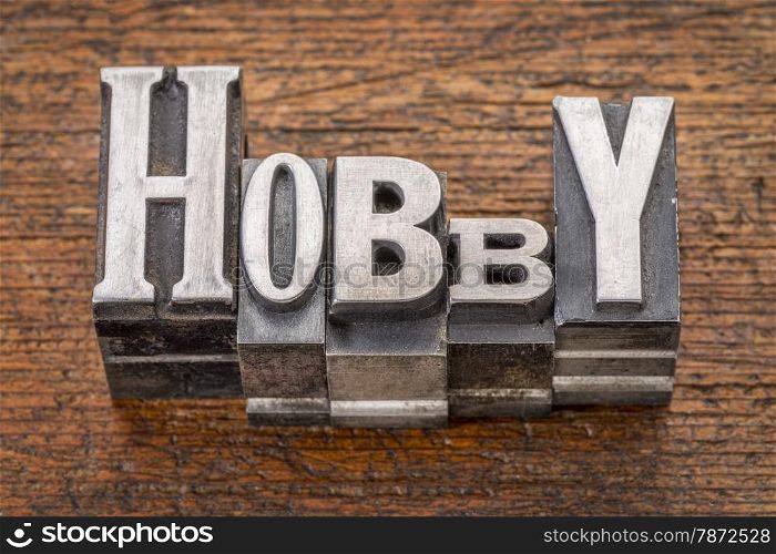 hobby word in mixed vintage metal type printing blocks over grunge wood