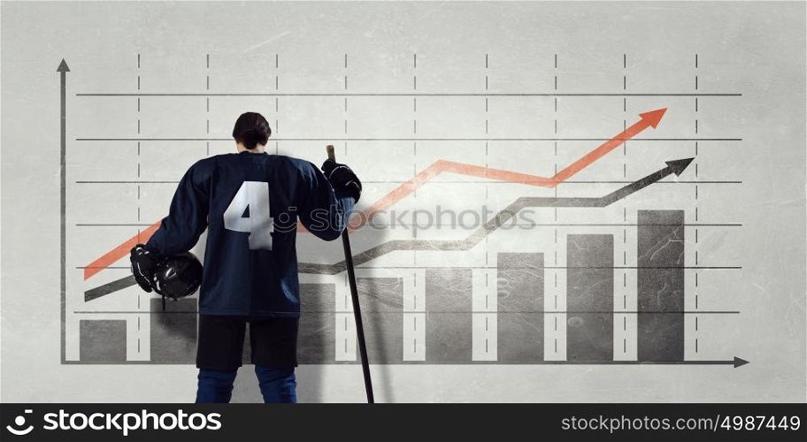 Hockey player and dynamics graph. Ice hockey player and graphs at background