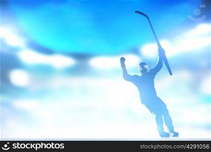 Hockey player celebrating goal, victory with hands and stick up in the air. Win the match. Full arena night lights