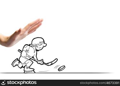 Hockey player. Close up of human hand and caricature of funny hockey player