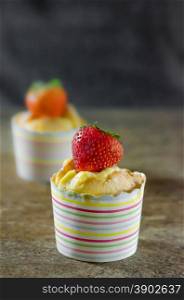 Hokkaido Chiffon Cupcakes. Hokkaido Chiffon Cupcakes over wooden table