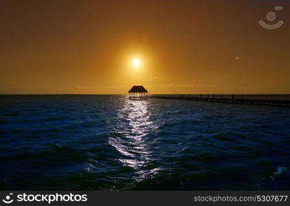 Holbox island sunset beach tropical hut pier in Mexico