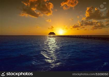 Holbox island sunset beach tropical hut pier in Mexico