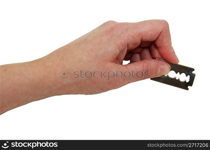 Holding a silver razor blade used for shaving or cutting items - path included