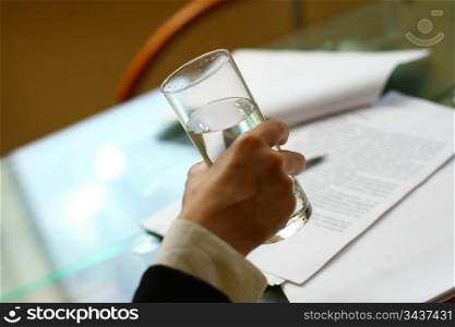Holding a water glass