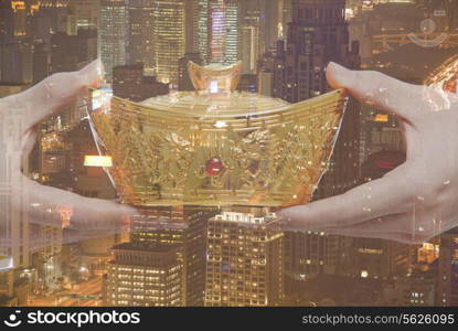 Holding Chinese New Year Gold Ingot, Night City View