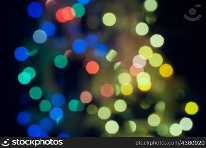 Holiday backdrop. Abstract circular bokeh background of Christmaslights