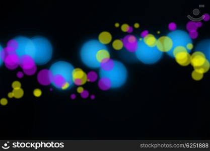 Holiday background, bokeh border with blur colorful lights isolated on black