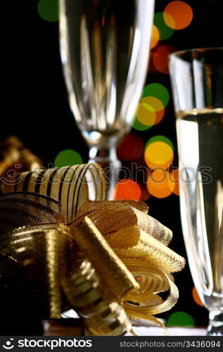 holiday card golden champagne and gift