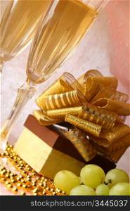 holiday card golden champagne and gift