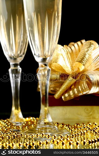 holiday card golden champagne and gift