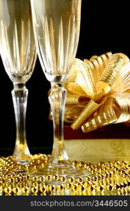 holiday card golden champagne and gift