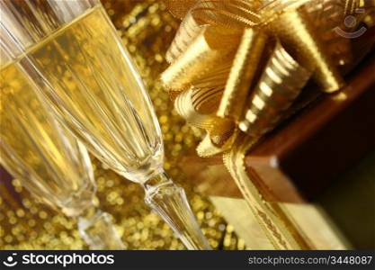 holiday card golden champagne and gift
