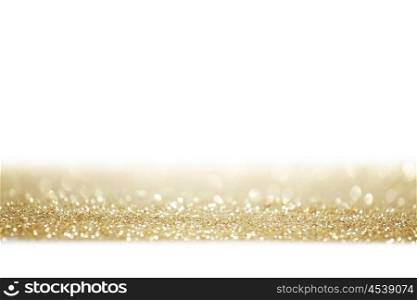 Holiday golden glitters isolated on white background