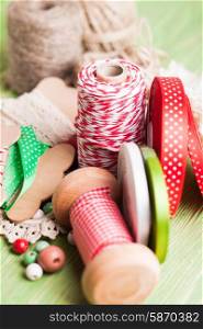Holiday rope and ribbon decorations for craft paper gift box