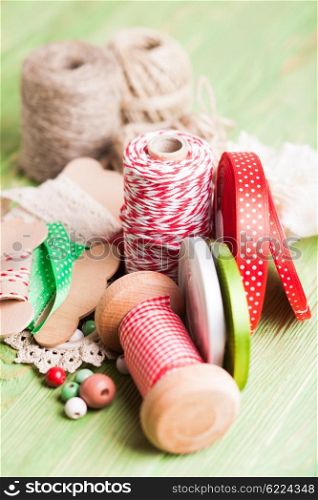 Holiday rope and ribbon decorations for craft paper gift box. The Holiday decor