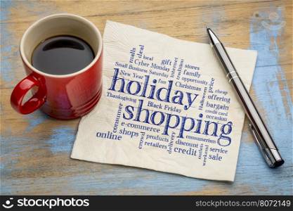 holiday shopping word cloud - handwriting on a napkin with a cup of coffee