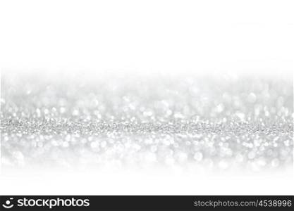 Holiday silver glitters isolated on white background