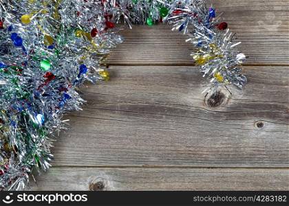 Holiday Tinsel on Rustic Wood