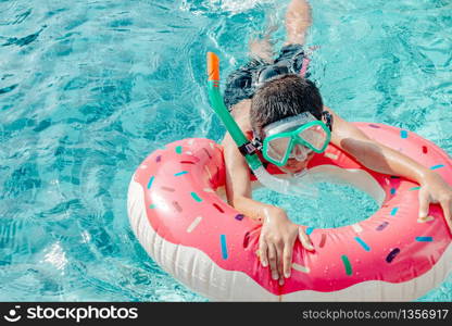 Holiday, vacation concept, Children swimming in the pool are very fun.