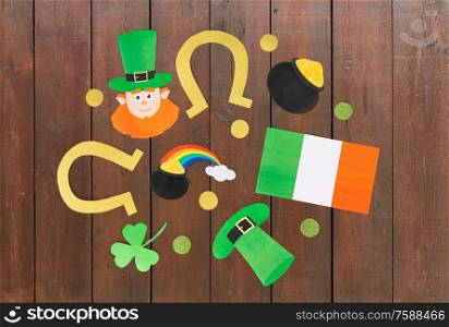 holidays and celebration concept - st patrick&rsquo;s day decorations or party props made of paper on white background. st patrick&rsquo;s day decorations on white background