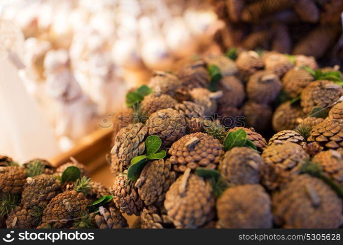 holidays and christmas concept - close up of cone wreath decoration. close up of cone christmas decoration