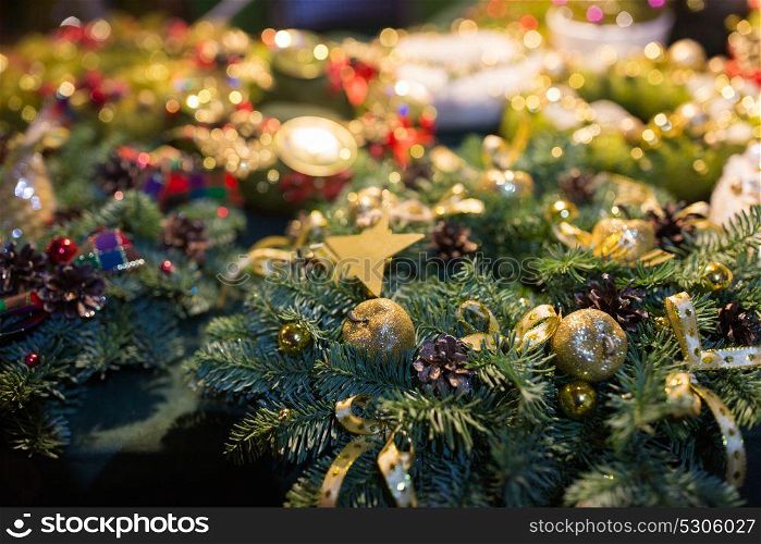 holidays and decoration concept - close up of christmas fir tree wreath. close up of christmas fir tree wreath
