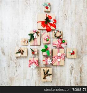 Holidays boxes in shape of Cristmas tree. Christmas craft boxes