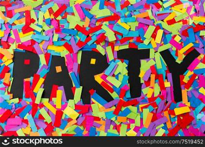 holidays, celebration and lettering concept - black party word made of multicolored papers. black party word made of multicolored papers