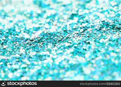 holidays, decoration and texture concept - blue glitter or sequins background