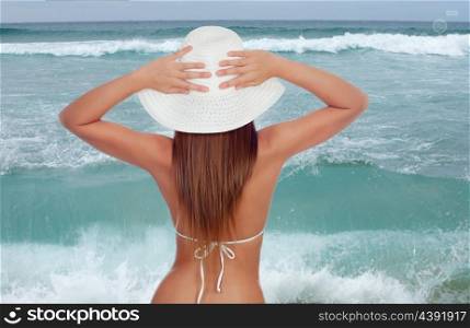 Holidays in the beach. Sexy girl in bikini