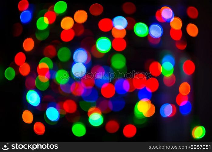 Holidays lights background. Bokeh background. Lightbulb background. Holidays lights background