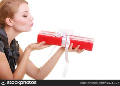Holidays love and happiness concept - beautiful blonde girl with red gift box blowing a kiss isolated