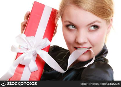 Holidays love and happiness concept - beautiful blonde girl with red gift box isolated