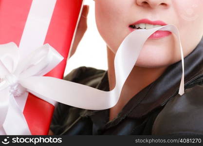 Holidays love and happiness concept - beautiful blonde girl with red gift box isolated