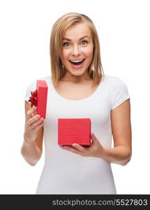 holidays, love and happiness concept - beautiful girl with gift box