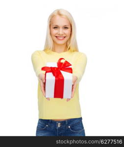 holidays, love and happiness concept - beautiful girl with gift box