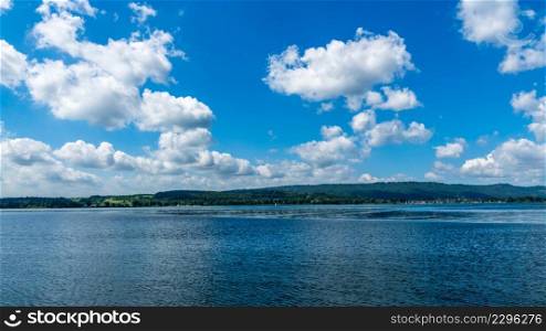 Holidays on beautiful Lake Constance summer time with blue sky and lake view
