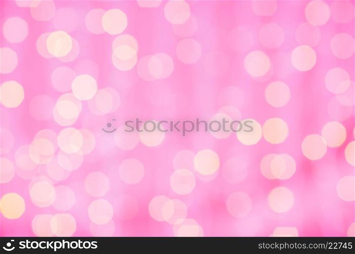 holidays, party and celebration concept - blurred pink and golden background with bokeh lights