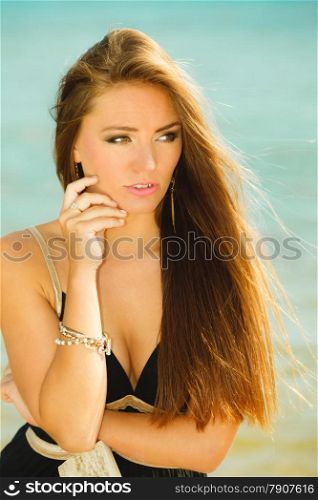Holidays, vacation travel and freedom concept. Beautiful sexy girl on beach. Young pretty woman relaxing on the sea coast.