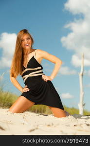 Holidays, vacation travel and freedom concept. Beautiful sexy girl on beach. Young pretty woman relaxing on the sea coast.