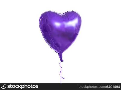 holidays, valentines day and party decoration concept - close up of inflated helium heart shaped balloon over white background. close up of helium balloon over white background. close up of helium balloon over white background