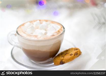 holidays, winter, celebration and good morning concept - Christmas and new year card with cup of cacao hot chocolate with marshmallow and gingerbread cookies blurred lights on background. Christmas and new year card with cup of cacao hot chocolate with marshmallow and gingerbread cookies blurred lights on background - holidays, winter, celebration and good morning concept